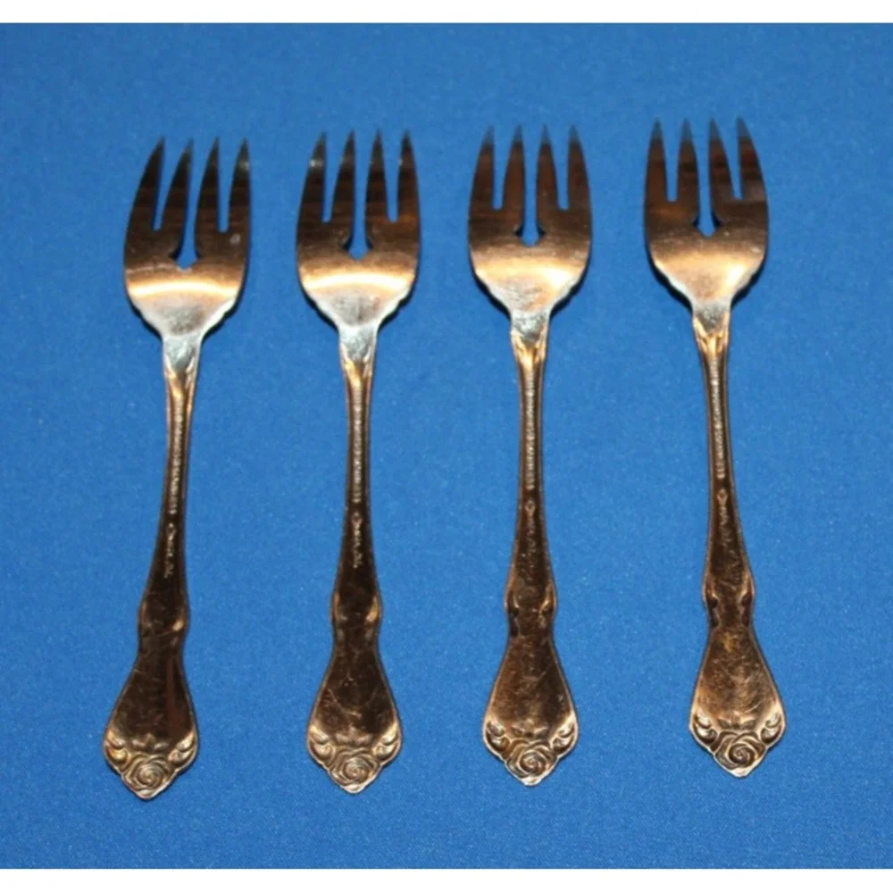 4 1881 Rogers stainless steel salad forks Oneida Ltd. Arbor Rose flatware lot